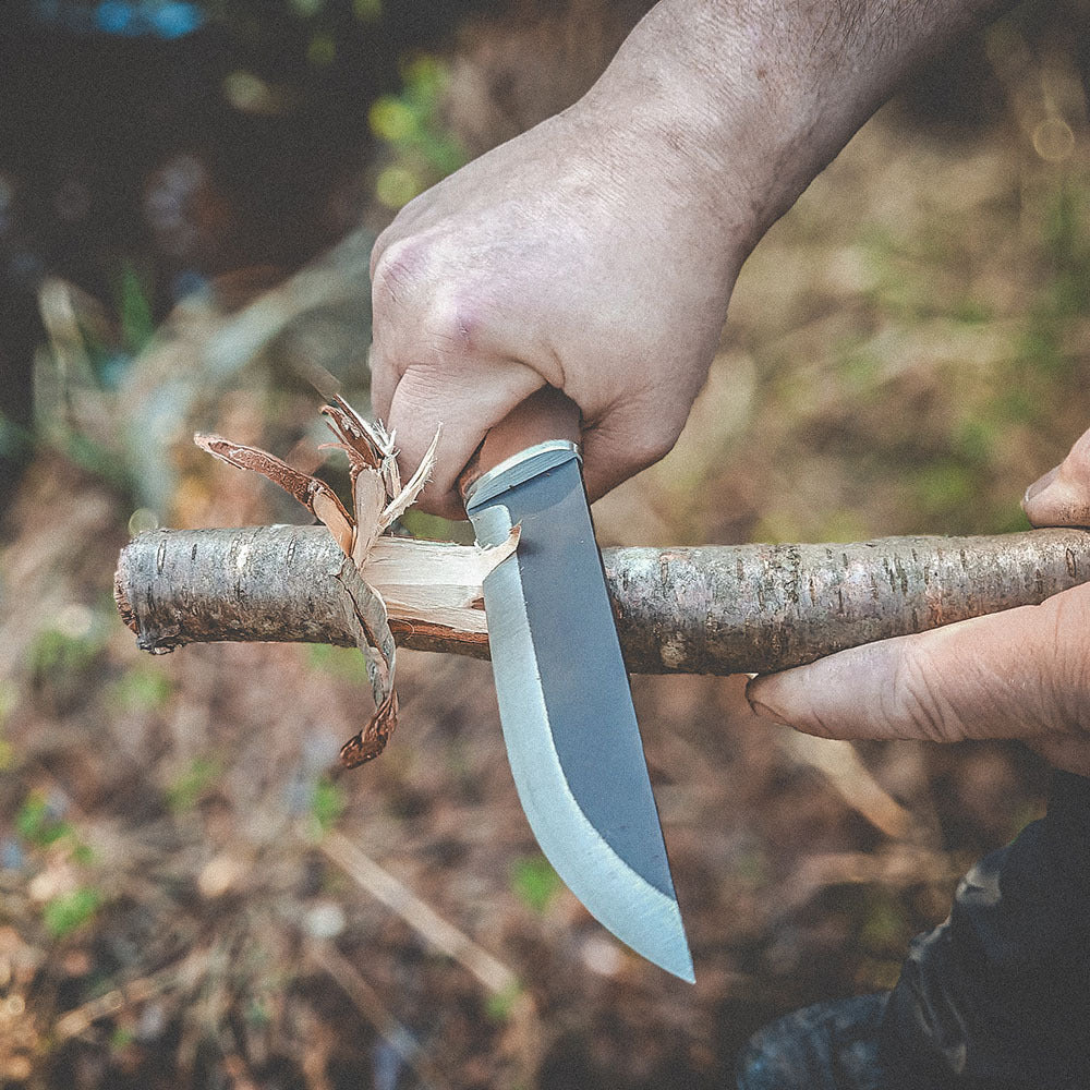 Rosellis Finnish Hunting knife with a long carbon steel blade for hunting, camping and outdoor activities.