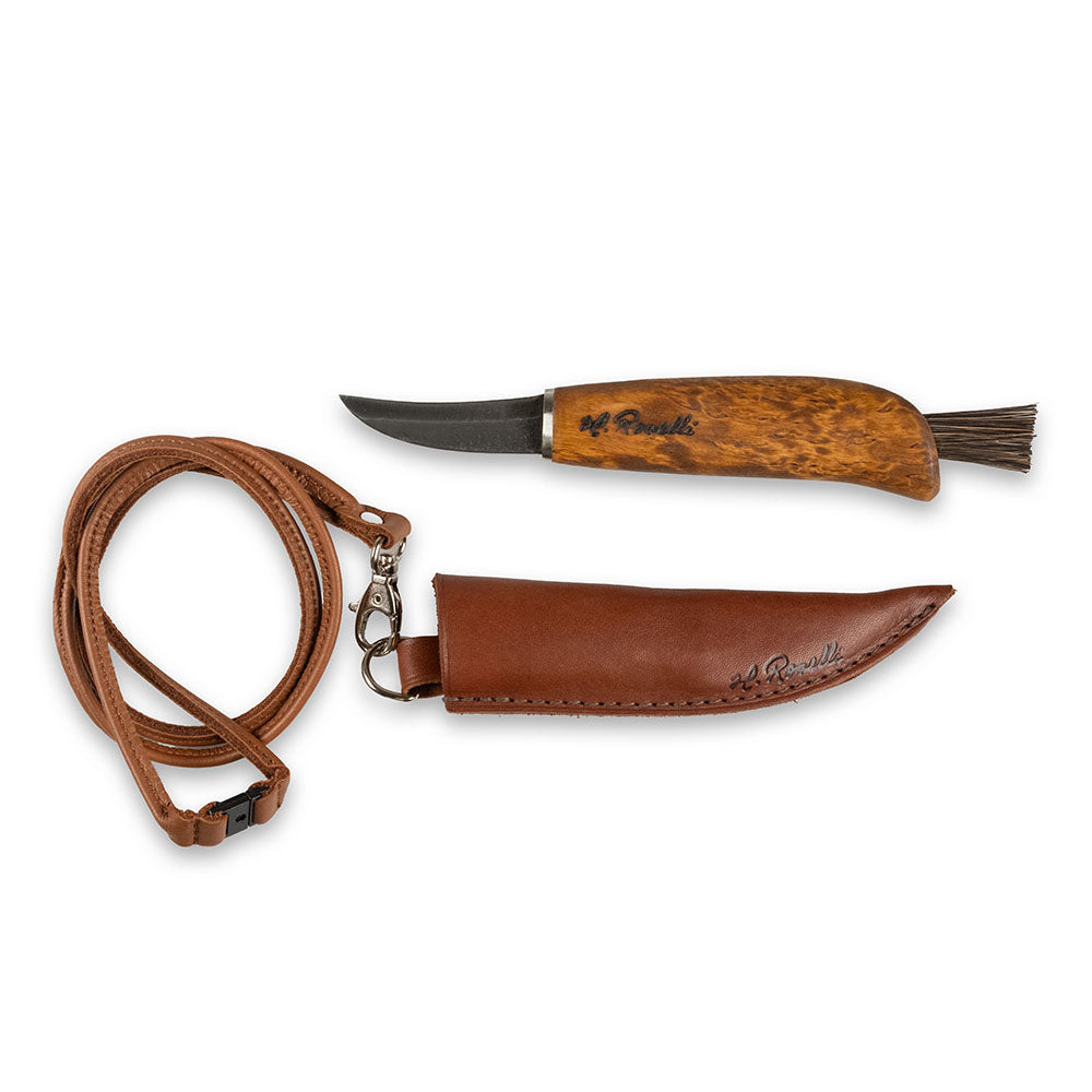 Finnish handmade mushroom knife made from carbon steel and curly birch. Comes with a handmade leather sheath and a mushroom brush made from arenga fiber