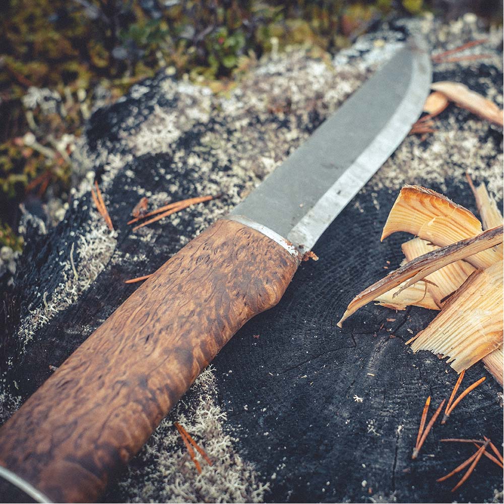 Handmade Finnish hunting knife with a long knife blade with silver ferrule details 